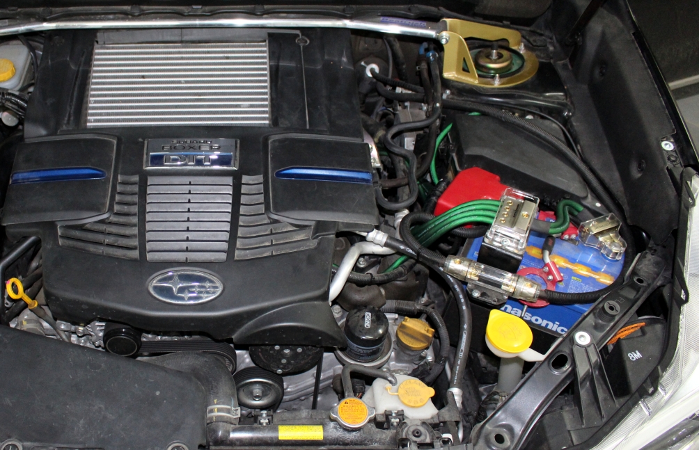 Протяжка электропроводки усилителей на Subaru Forester SJ в магазине автозвука и аксессуаров kSize.ru